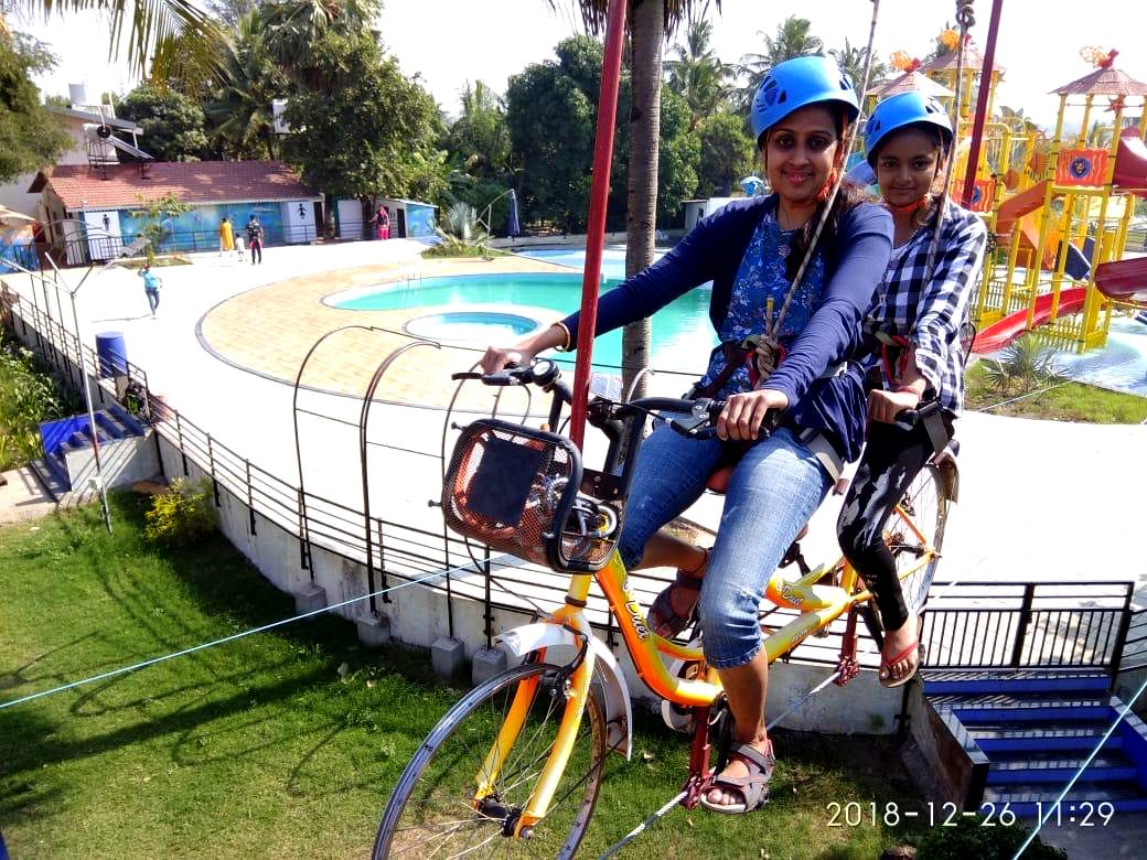 Cycling on a rope high above the ground